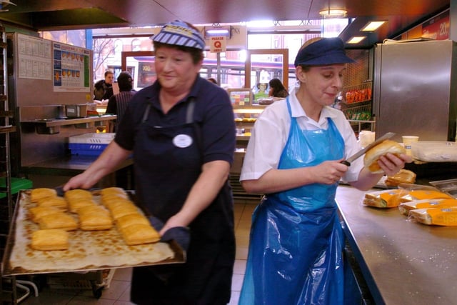 The YEP went behind the scenes at Greggs bakery in Leeds city centre in 2004. Pictured is Sue Abbott, right, shop support manager, at Greggs on the Headrow,  preparing 'oval bites'.
