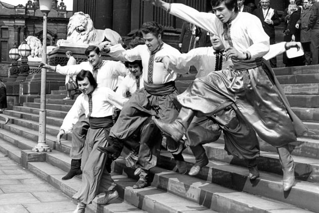 Ukrainian dancers on the steps of the Town Hall in April 1971. The Red Army ensemble were performing at the Grand Theatre but had just been charged on this day, with disorderly conduct.