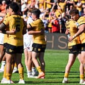 Castleford Tigers players celebrate their 36-34 victory against Leeds Rhinos. Picture by Matthew Merrick/SWpix.com.