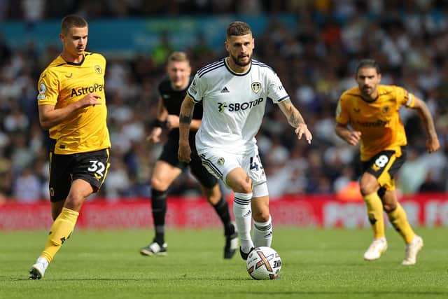 Mateusz Klich of Leeds United runs with the ball during the Premier League match between Leeds United and Wolverhampton Wanderers (Photo by David Rogers/Getty Images)