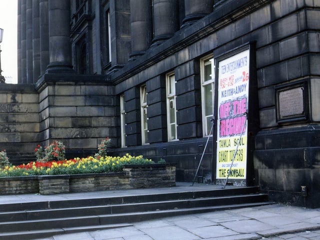 The lower part of Morley Town Hall, showing steps and flower beds outside. A notice against the wall advertises Teen Entertainments every Wednesday with Keith & Andy, Off the Record, Tamla Soul, Chart Toppers and the Snowball.