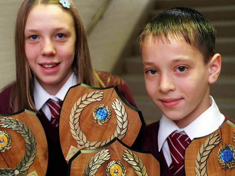 Intake High School pupils Gary Barker and Sophie Gilbertson were national U-12s disco dance champions. They are pictured in November 1998 with some of their dancing medals.