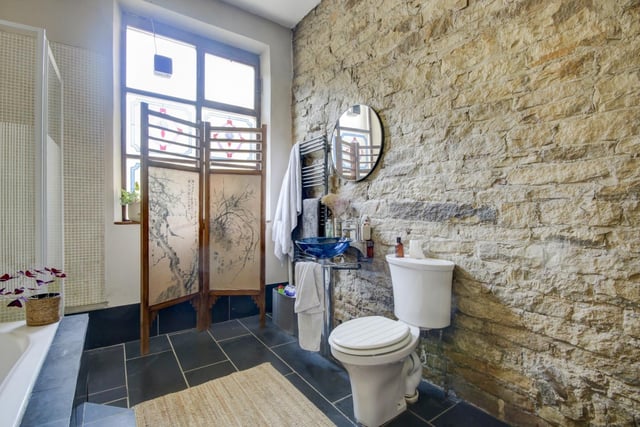 Located at the end of the apartment there is a stunning, large house bathroom, which has an exposed stone wall within. There is a four-piece suite (large bath, separate shower cubicle, basin and toilet) and the bathroom is tastefully tiled.