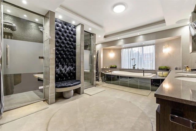 The property features nine bathroom, including this beautifully appointed en-suite.