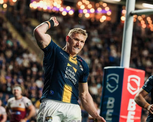 Mikolaj Oledzki celebrates scoring during Leeds Rhinos' home win against Huddersfield Giants in May. Picture by Alex Whitehead/SWpix.com.