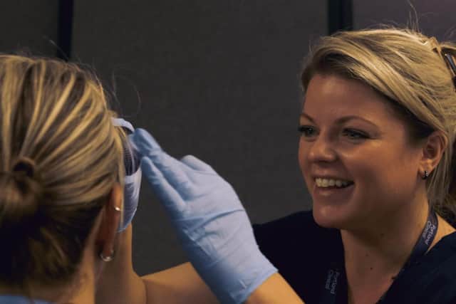 Natalie Fisher screening Northern Diamonds bowler Katie Levick