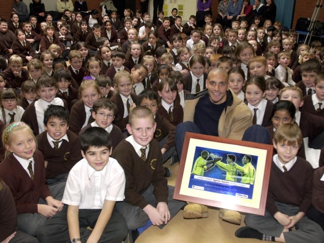Rio Ferdinand presents the Leeds United Kick Racism Out of Football award to Beeston St. Anthony's Primary in January 2002.
