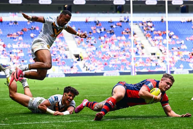 Cam Scott scores for Wakefield Trinity in their Magic Weekend win against Castleford Tigers at Everton FC's Hill Dickinson Stadium in Liverpool. Picture by Olly Hassell/SWpix.com.