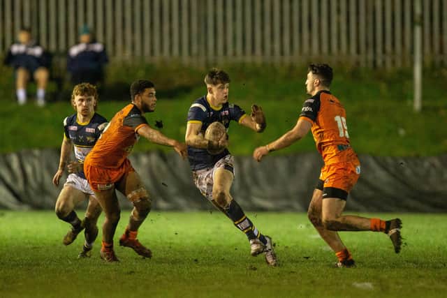 Riley Lumb, pictured in action for Rhinos reserves against Castleford, scored a hat-trick in the under-18s' opening win at Newcastle. Picture by Craig Hawkhead/Leeds Rhinos.