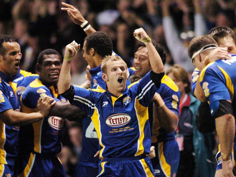 Rob Burrow - who the Grand Final man of the match trophy was named after 20 years later - celebrates Danny McGuire's try.