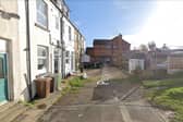 Emergency services responded to an incident where a man was trapped following a wall collapse in Perseverance Terrace, Batley. Picture: Google