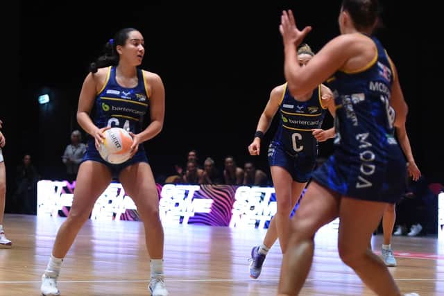 Brie Grierson, left, and her Leeds Rhinos Netball team-mates playing Saracens Mavericks at the first direct Arena (Picture: MATTHEW MERRICK PHOTOGRAPHY)