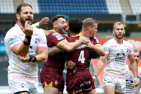 Rhinos' Aidan Sezer and Jarrod O'Connor react after Kevin Naiqama's controversial touchdown for Giants. Picture by Ed Sykes/SWpix.com.