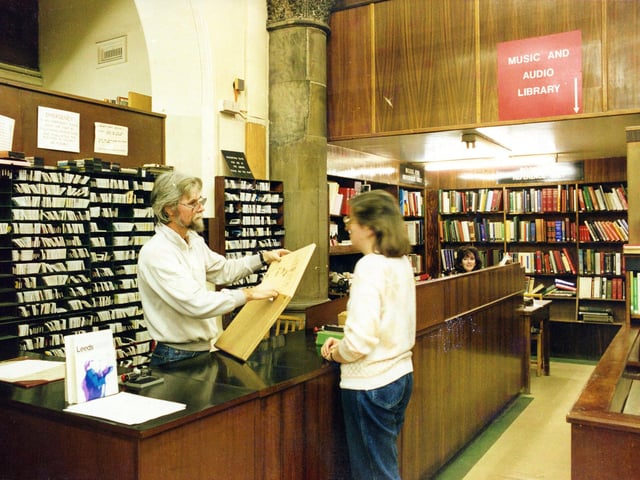 The counter of the Music Library in a corner of the Central Lending department in the Central Library. Behind the counter are rows of cassettes ready for loan for which the boxes will be out on display. Records were also available. These have now been replaced by CD's and DVD's in the much larger Music Library on the first floor, but music books and scores are still available.