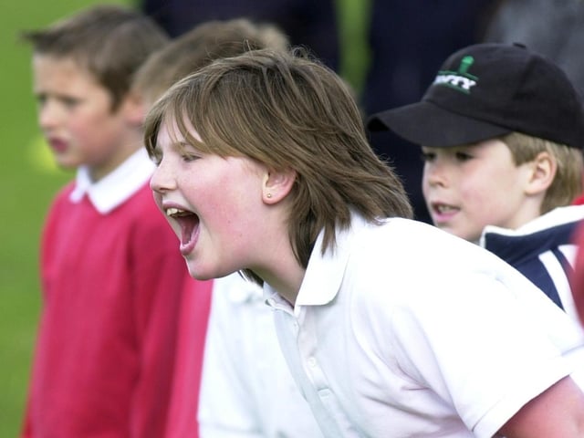 Calverley Park held the Airedale Wharfedale Schools girls football tournament in May 2002. Pictured are pupils from Calverley C of E School screaming encouragement to their team.