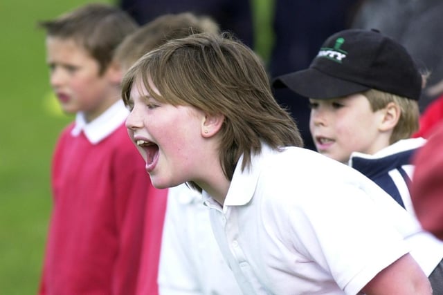 Calverley Park held the Airedale Wharfedale Schools girls football tournament in  May 2002. Pictured are pupils from Calverley C of E School screaming encouragement to their team.