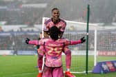 CHIEF ARCHITECT: Crysencio Summerville, top, pictured celebrating with goalscorer Willy Gnonto after Gnonto's second goal in Tuesday night's 4-0 victory at Championship hosts Swansea City. Photo by David Davies/PA Wire.