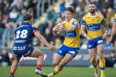 Teenager Joe Diskin in action for Leeds Rhinos agianst Wakefield Trinity last Boxing Day. Picture by Tony Johnson.