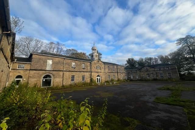 Woolley Hall has been sold at auction for £1.5million.