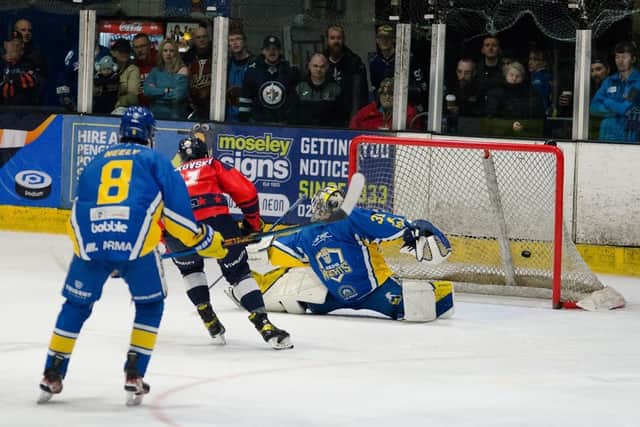 SWIFT REPLY: Peterborough Phantoms’ Lukas Sladkovsky fires past Leeds Knights' Sam Gospel on a breakaway during Sunday's NIHL National play-off final in Coventry on Sunday. Picture courtesy of Chris Callaghan.