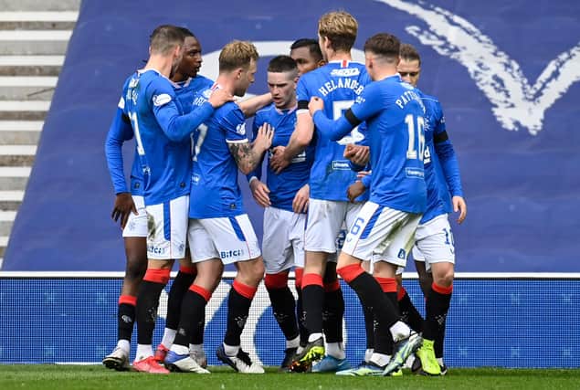 GLASGOW, SCOTLAND - APRIL 18: Rangers' players celebrate after Jonjoe Kenny's own goal makes it 2-0 during a Scottish Cup tie between Rangers and Celtic at Ibrox Stadium, on April 18, 2021, in Glasgow, Scotland. (Photo by Rob Casey / SNS Group)