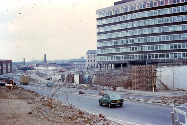 Westgate showing the construction of Stage 3 of the Inner Ring Road under a light covering of snow. To the right, Telephone House in Westgate is visible and at the far left is Dunlop Rubber Co. Ltd., motor tyre manufacturers also in Westgate. Stage 3 of the Inner Ring Road was completed in February 1975. The photograph is taken from the old Police Headquarters, formerly Brotherton House on Westgate.