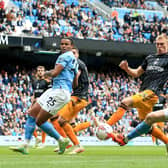 SURPRISE: Leeds United's Rasmus Kristensen, middle, as a centre-back in Saturday's clash against Manchester City at the Etihad.  Photo by LINDSEY PARNABY/AFP via Getty Images.