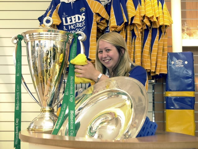 Leeds Rugby opened its new Headingley retail store. Pictured is shop assistant Emma Horsfall polishing the Heineken Cup and Zurich Premiership Shield, both on which were on display.