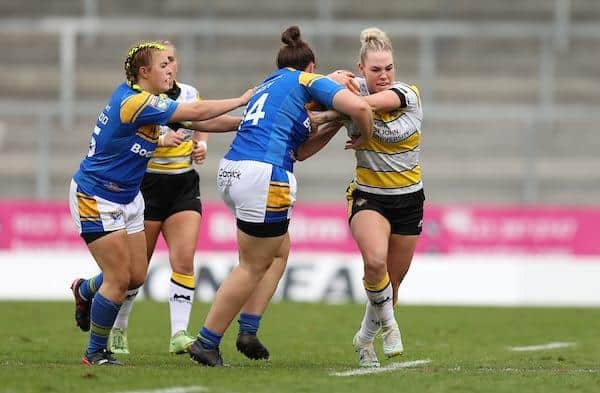 York City Knights' Hollie Dodd is tackled by Rhinos' Shannon Lacey during last week's Grand Final.