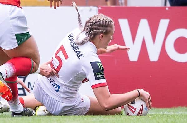 Rhinos' Caitlin Beevers scores for England against Wales in 2021. Picture by Allan McKenzie/SWpix.com.