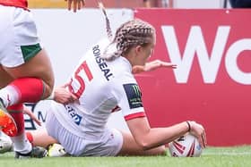Rhinos' Caitlin Beevers scores for England against Wales in 2021. Picture by Allan McKenzie/SWpix.com.