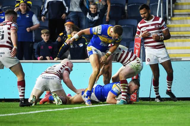 Harry Newman scores Rhinos' fifth try in the win over Wgan. Picture by Jonathan Gawthorpe.