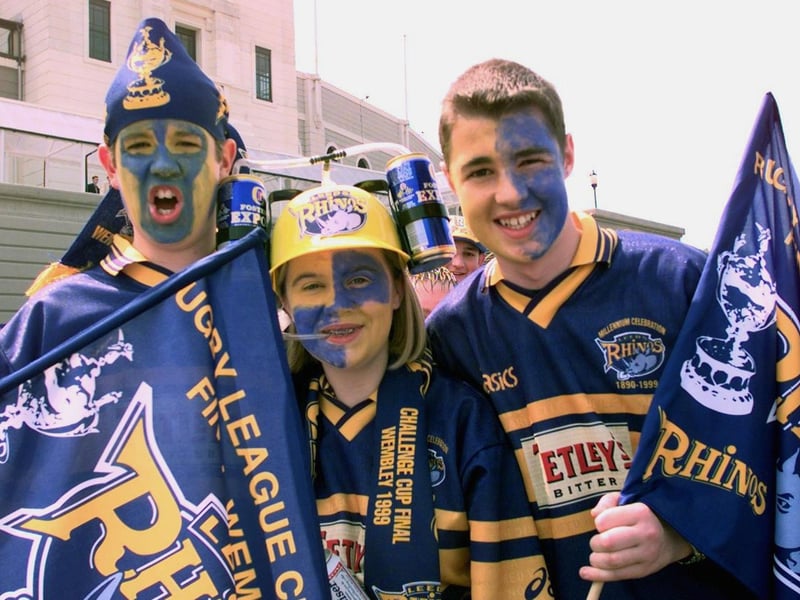 Fans Josh Booth, 13, Lucy Scollen, 18, and Richard Banks, 14, get in the mood for the big match.