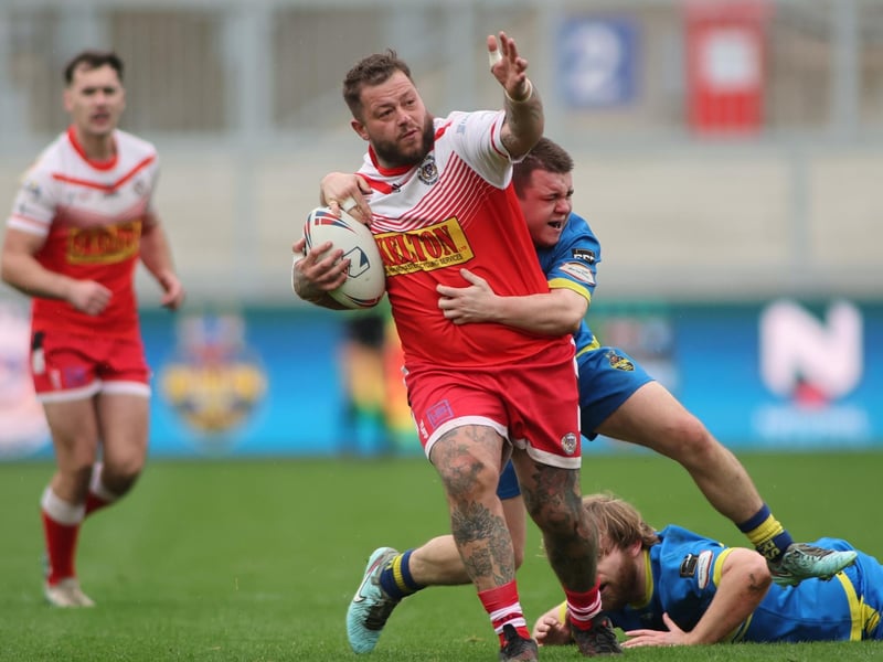 East Leeds' Roy Railton points the way towards the National League Premier Division as Oulton Raiders are beaten in the League One play-off final at Wakefield Trinity.