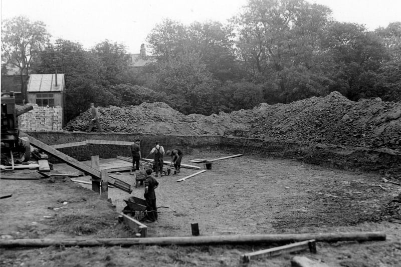 Workmen constructing a static water supply basin, in the grounds of St. Joseph's Seminary on Hyde Terrace, for wartime supply. Pictured in September 1942.