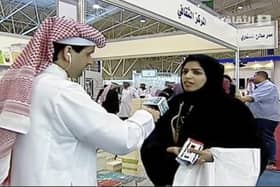 In this frame grab from Saudi state television footage, doctoral student and women's rights advocate Salma al-Shehab speaks to a journalist at the Riyadh International Book Fair back in March 2014. Picture: Saudi state television via AP