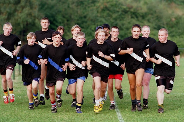 Players from two rugby league sides Hunslet Parkside and Middleton Marauders merged to become Hunslet Juniors. They are pictured  training at South Leeds Stadium in September 1998.