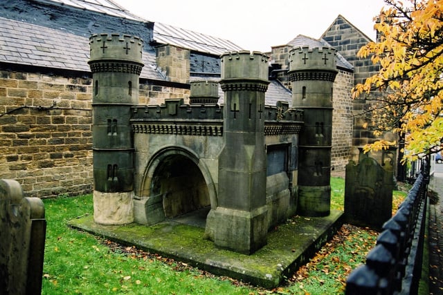 The Bramhope Tunnel Memorial in Church Lane built in remembrance of all the men who were killed in the construction of the Bramhope Tunnel on the Leeds and Thirsk railway. This castellated stone building is a replica of the tunnels northern portal entrance. The Bramhope Tunnel opened in 1849 and took several years to build during which time 23 men lost their lives. Pictured in October 2003.
