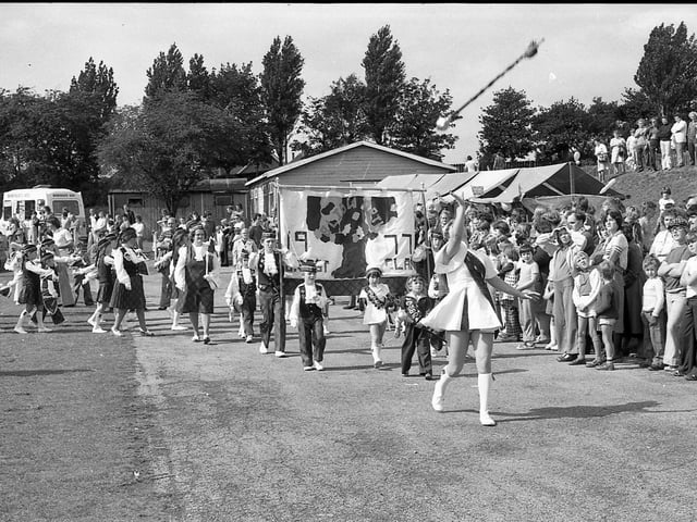 Can you spot any familiar faces in the parade?