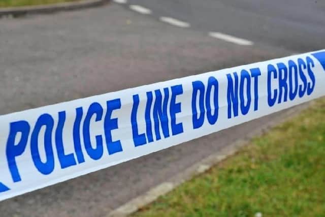 A scene remains in place on Albion Street.