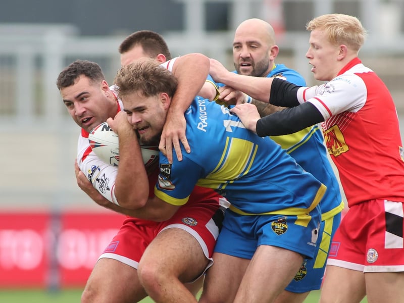 Action from the National League Division One play-off final between East leeds, in red and Oulton Raiders.