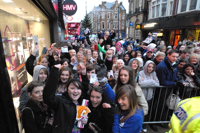 Fans pictured outside HMV as they waited to see Joe after his X Factor win in 2009.