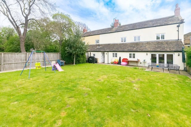 A large rear garden is mainly laid to lawn and offers beautiful views overlooking the award winning Oulton Golf Course.