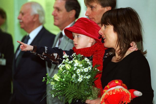 Young Olivia Crook points out the Princess Royal to her mum Christine as the wait to present some flowers to the Princess during a visit to Cookridge Hospital in November 1996.