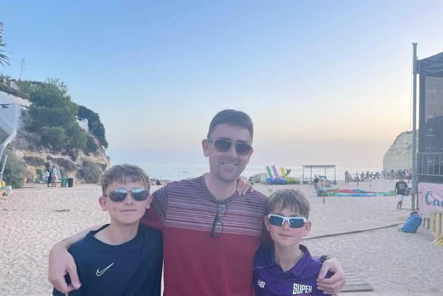 Daniel Gilliland with his sons Felix, left, and George in Portugal in August 2023 (Photo by Brain Tumour Research/SWNS)