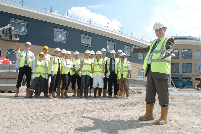 Representatives from Sweden join South Leeds High School head teacher Colin Bell at the site of the new school in Belle Isle in June 2006.