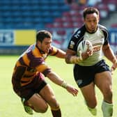 Willie Poching on the attack for Rhinos against Huddersfield in 2006. Picture by Steve Riding.