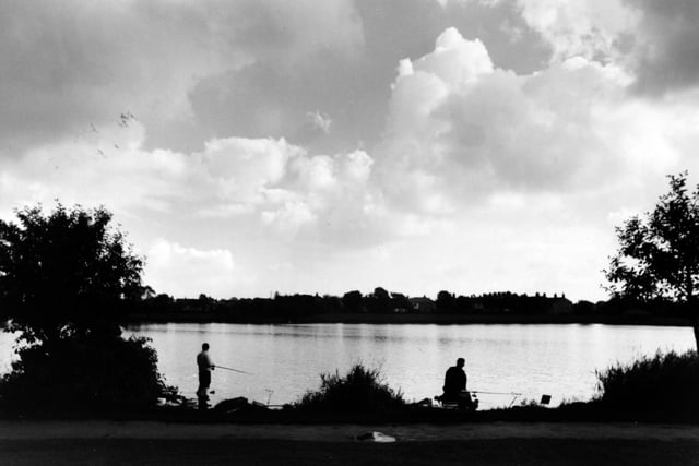 Anglers aim for a catch of the day at Yeadon Tarn in May 1994.
