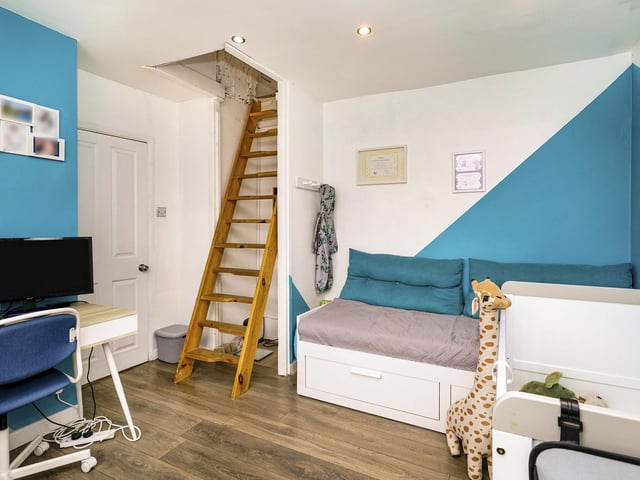 Within the first bedroom there is access to an occasional loft room that could be used as a study or storage area.