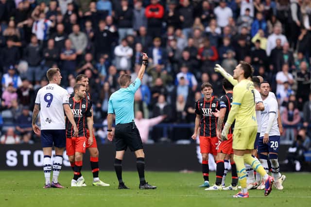 MARCHING ORDERS: For Leeds United loanee Sam Greenwood, right, pictured being sent off by referee Matt Donohue in Sunday's Championship Lancashire derby between Preston North End and Blackburn Rovers at Deepdale. Photo by Gary Oakley/Getty Images.